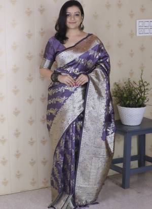Looking These Party Wear Saree in Fine Colored.These Saree And Blouse is Fabricated On Banarasi Silk.Its Beautified With Weaving Silver Jari Designer.