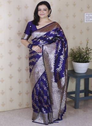 Looking These Party Wear Saree in Fine Colored.These Saree And Blouse is Fabricated On Banarasi Silk.Its Beautified With Weaving Silver Jari Designer.