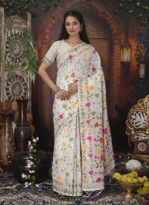 Attractive These Fastive And Party Wear Saree in Fine Colored.These Saree And Blouse is Fabricated On Linen Cotton.Its Beautified With Heavy Woven Multy Thread Designer.