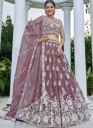 For A Fancy Designer Look,Grab These Lehenga Choli With Dupatta in Fine Colored.These Lehenga And Choli Are Organza And Dupatta Are Fabricated On Organza Pair.Its Beautified With Fancy Heavy Designer Embroidery Work. 