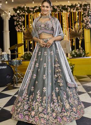 For A Fancy Designer Look,Grab These Lehenga Choli With Dupatta in Fine Colored.These Lehenga And Choli Are Tissue And Dupatta Are Fabricated On Tissue Pair.Its Beautified With Fancy Heavy Designer Embroidery Work. 