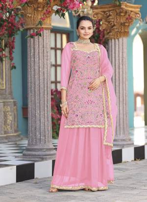 Attrective Looking These Party Wear Skirt Suit in Fine Colored Pair With Bottom And Dupatta.These Top Are Georgette And Dupatta Are Fabricated On Net Pair With Georgette Bottom.Its Beautified With Designer Heavy Multy Thread Embroidery Work.