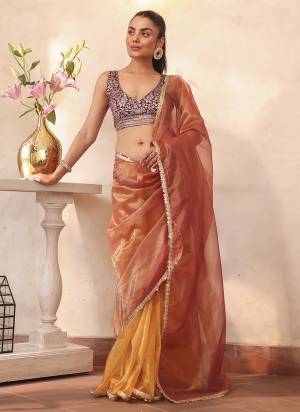 Attractive These Fancy Party Wear Saree in Fine Colored.These Saree Are Organza And Blouse is Fabricated On Art Silk Pair.Its Beautified With Solid Disigner.