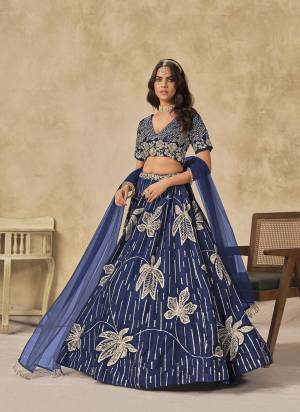For A Designer Look,Grab These Party Wear Lehenga Choli in Fine Colored.These Lehenga And Blouse Are Fabricated On Art Silk Pair With Art Silk Dupatta.Its Beautified With Designer Sequance Embroidery Work.