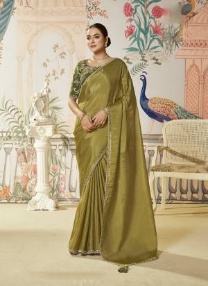 Look Attractive These Designer Party Wear Fancy Saree in Fine Colored.These Saree Are Satin Silk And Blouse Two Tone Satin Silk is Fabricated.Its Beautified Fancy Dual Sequance Embroidery,Applique Work.