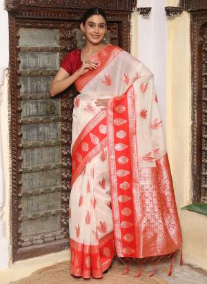 Garb These Fastive And Party Wear Saree in Fine Colored.These Saree And Blouse is Fabricated On Linen Cotton.Its Beautified With Weaving Jari Designer.