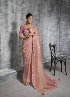Looking These Fastival Wear Saree in Fine Colored.These Saree Are Tissue Silk And Blouse is Fabricated On Silk.Its Beautified With Designer Mirror,Jari,Sequance Embroidery With Pearl Stone Work.
