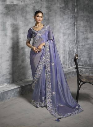 Looking These Fastival Wear Saree in Fine Colored.These Saree Are Tissue Silk And Blouse is Fabricated On Silk.Its Beautified With Designer Mirror,Jari,Sequance Embroidery With Pearl Stone Work.