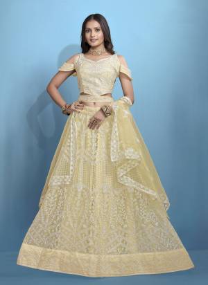 Grab These Beautiful Colored Lehenga Choli.These Lehenga and Dupatta Are Fabricated On Net Pair With Net Blouse.Its Beautified With Designer Thread Embroidery Work.