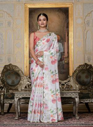 Looking These Party Wear Ready To Wear Saree in Fine Colored.These Saree is Fabricated On Chinon Pair With Chinon Blouse.Its Beautified Designer Digital Printed With Mirror Cut Work  Border.
