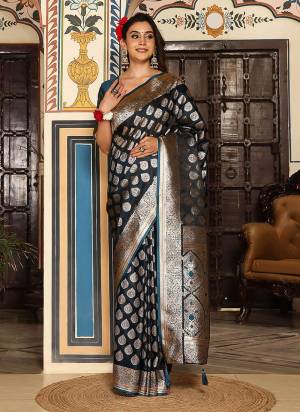 Garb These Fastive And Party Wear Saree in Fine Colored.These Saree And Blouse is Fabricated On Silk Blend.Its Beautified With Weaving Jari Designer.