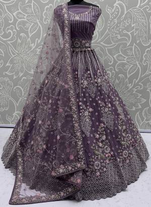 For A Fancy Designer Look,Grab These Lehenga Choli With Dupatta in Fine Colored.These Lehenga And Choli Are Net And Dupatta Are Fabricated On Soft Net Pair.Its Beautified With Heavy Flower Multy Cotton Thread,Silver Dori, Sequance Embroidery,Zarkon Diamond With Crystal Pipi Hand Work. 