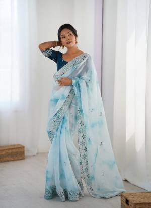 Garb These Party Wear Saree in Fine Colored.These Saree Are Fendy And Blouse is Malai Silk Fabricated.Its Beautified With Badal Printed Designer With Sequance,Coding Embroidery Work.