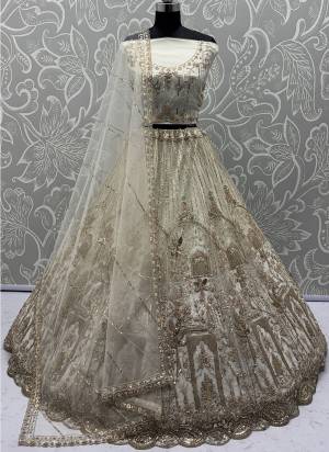 For A Fancy Designer Look,Grab These Lehenga Choli With Dupatta in Fine Colored.These Lehenga And Choli Are Net And Dupatta Are Fabricated On Soft Net Pair.Its Beautified With Heavy Dori, Sequance Embroidery,Modif Pipe Work. 