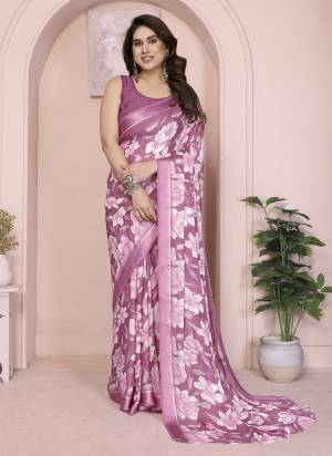 Garb These Party Wear Saree in Fine Colored.These Saree Are Moss Satin Patta And Blouse is Moss Satin Patta Fabricated.Its Beautified With Woven Patta Border Designer Printed.