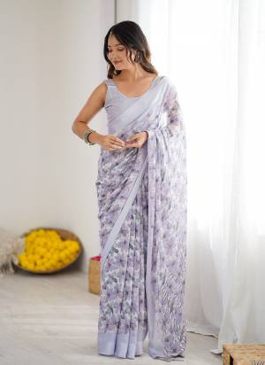 Garb These Party Wear Saree in Fine Colored.These Saree Are Georgette And Blouse is Fabricated On Georgette Pair.Its Beautified With Plain Saree With Woven Border Designer Printed Saree.