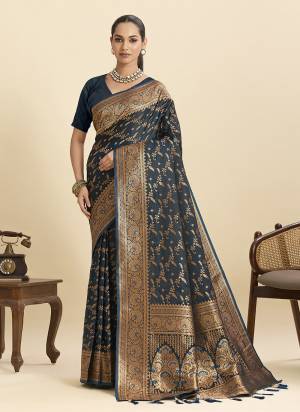 Attractive This Party Wear Saree Paired With Blouse.This Saree And Blouse Are soft Silk Fabric With Heavy Woven Jari Designer. Buy This Pretty Saree Now.