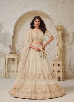 For A Designer Look,Grab These Lehenga Choli in Fine Colored.These Lehenga And Choli Are Fabricated On Silk Pair With Soft Net Dupatta.Its Beautified With Designer Embroidery,Hand Work.