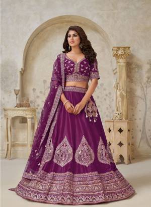 For A Designer Look,Grab These Lehenga Choli in Fine Colored.These Lehenga And Choli Are Fabricated On Silk Pair With Soft Net Dupatta.Its Beautified With Designer Embroidery,Hand Work.