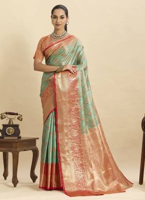 Attractive This Party Wear Saree Paired With Blouse.This Saree And Blouse Are Silk Fabric With Heavy Woven Jari Designer. Buy This Pretty Saree Now.