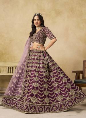 For A Designer Look,Grab These Party Wear Lehenga Choli in Fine Colored.These Lehenga And Blouse Are Fabricated On Art Silk Pair With Net Dupatta.Its Beautified With Designer Sequance Embroidery Work.
