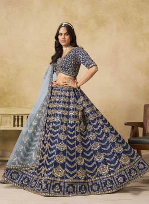 For A Designer Look,Grab These Party Wear Lehenga Choli in Fine Colored.These Lehenga And Blouse Are Fabricated On Art Silk Pair With Net Dupatta.Its Beautified With Designer Sequance Embroidery Work.