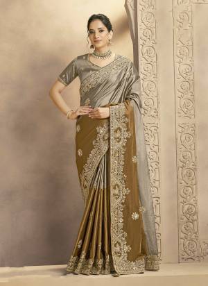 Look Attractive These Designer Party Wear Fancy Saree in Fine Colored.These Saree Are Metallic Kora Jari Silk And Blouse Matallic Kora Jari Silk is Fabricated.Its Beautified Fancy Jardosi,Cutdana Hand Work.
