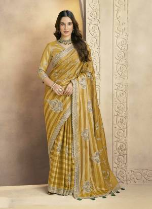Look Attractive These Designer Party Wear Fancy Saree in Fine Colored.These Saree Are Kanjivaram Jari Silk And Blouse Kanjivaram Jari Silk is Fabricated.Its Beautified Fancy Sequance,Aari,Stone Work.