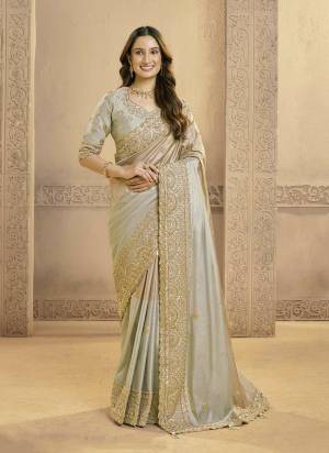 Look Attractive These Designer Party Wear Fancy Saree in Fine Colored.These Saree Are Matallic Kora Jari Silk And Blouse Matallic Kora Jari Silk is Fabricated.Its Beautified Fancy Sequance Embroidery,Beads Work,Scallops.