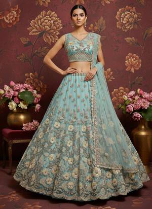 For A Fancy Designer Look,Grab These Lehenga Choli With Dupatta in Fine Colored.These Lehenga And Choli Are Net And Dupatta Are Fabricated On Soft Net Pair.Its Beautified With Heavy Sober Color Sequance,Jari,Dori Embroidery,Modif Crystal Pipe Hand Work. 