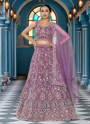 Attrective Looking This Party Wear Fine Color Fancy Heavy Designer Choli And Lahenga Fabriced On Net And Dupatta Net In Fabricated Beautified With Attrective Designer Heavy Sequance, Thread Embroidery Work. Buy Now.