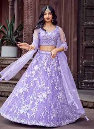 Attrective Looking This Party Wear Fine Color Fancy Heavy Designer Choli And Lahenga Fabriced On Net And Dupatta Net In Fabricated Beautified With Attrective Designer Heavy Sequance, Thread Embroidery Work. Buy Now.