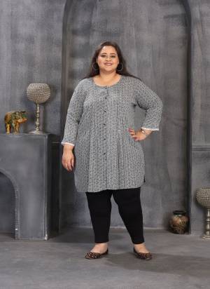 Grab These Beautiful Looking Readymade Big SizeTop.These Top is Fabricated On Rayon.Its Beautified With Designer Printed.