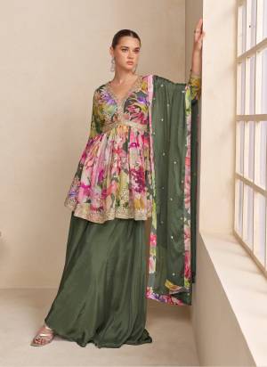 Garb These Party Wear Designer Plazzo Suit in Fine Colored Pair With Bottom And Dupatta.These Top And Bottom Are Fabricated On Chinon Pair With Chinon Dupatta.Its Beautified With Designer Printed With Embroidery Work.