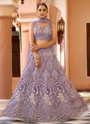 Attrective Looking This Party Wear Fine Color Fancy Heavy Designer Choli And Lahenga Fabriced On Net And Dupatta Net In Fabricated Beautified With Attrective Designer Heavy Sequance,Thread Embroidery Work. Buy Now.