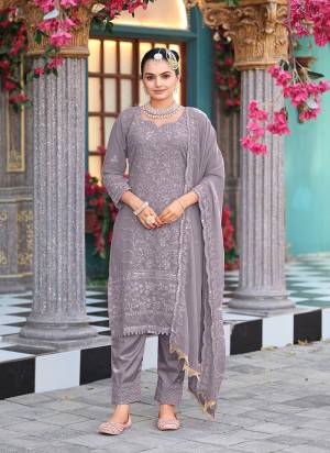 Attrective Looking These Party Wear Suit in Fine Colored Pair With Bottom And Dupatta.These Top Are Georgette And Dupatta Are Fabricated On Georgette Pair With Santoon Bottom.Its Beautified With Designer Heavy Embroidery Work.