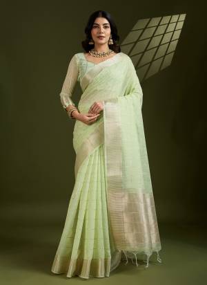 Looking These Festive Wear Saree in Fine Colored.These Saree And Blouse is Fabricated On Tissue Linen Silk.Its Beautified With Weaving Checks Designer.