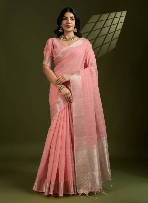 Looking These Festive Wear Saree in Fine Colored.These Saree And Blouse is Fabricated On Tissue Linen Silk.Its Beautified With Weaving Checks Designer.