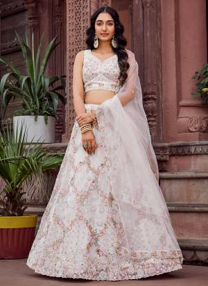 Attrective Looking This Party Wear Fine Color Fancy Heavy Designer Choli And Lahenga Fabriced On Net And Dupatta Net In Fabricated Beautified With Attrective Designer Sequance,Thread Embroidery Work. Buy Now.