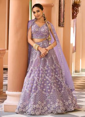 Attrective Looking This Party Wear Fine Color Fancy Heavy Designer Choli And Lahenga Fabriced On Net And Dupatta Net In Fabricated Beautified With Attrective Designer Sequance,Thread Embroidery Work. Buy Now.