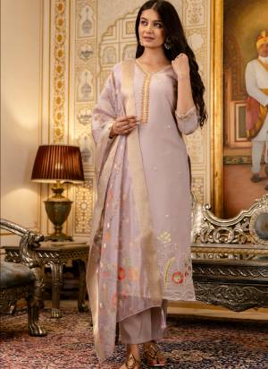 Looking These Suit in Fine Colored Pair With Bottom And Dupatta.These Top And Bottom Are Fabricated On Viscose Shimmer Pair With Jacquard Organza Dupatta.Its Beautified With Designer Embroidery Work.