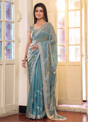 Garb These Fancy Party Wear Saree in Fine Colored.These Saree Are Tissue And Blouse is Fabricated On Art Silk Pair.Its Beautified With Fancy Disigner Embroidery Work Saree.