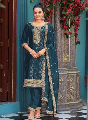 Attrective Looking These Party Wear Suit in Fine Colored Pair With Bottom And Dupatta.These Top Are Viscose Jacquard And Dupatta Are Fabricated On Chinon Pair With Santoon Bottom.Its Beautified With Woven Designer With Embroidery Work.