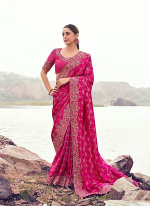 Attrective This Party wear Saree Paired With Blouse.This Saree Are Satin Jacquard Silk And Blouse Are Satin Silk Based Fabric With Weaving Jari Designer With Sequance,Jari,Thread Embroidery,Beads,Stone,Tassels Work. Buy This Pretty Saree Now.