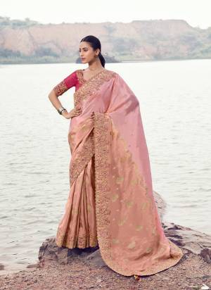 Attrective This Party wear Saree Paired With Blouse.This Saree Are Tissue Jacquard Silk And Blouse Are Tissue Silk Based Fabric With Weaving Jari Designer With Sequance,Jari,Thread Embroidery,Beads,Stone,Tassels Work. Buy This Pretty Saree Now.