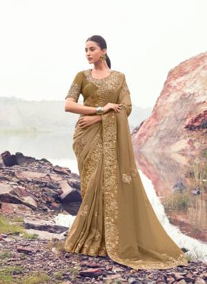 Attrective This Party wear Saree Paired With Blouse.This Saree Are Banarasi Silk And Blouse Are Satin Silk Based Fabric With Designer Sequance,Jari,Thread Embroidery,Beads,Stone,Tassels Work. Buy This Pretty Saree Now.