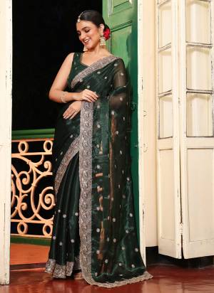 Garb These Fancy Party Wear Saree in Fine Colored.These Saree Are Organza And Blouse is Fabricated On Art Silk Pair.Its Beautified With Fancy Disigner Embroidery Work Saree.