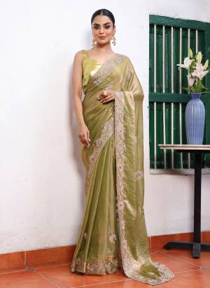 Garb These Fancy Party Wear Saree in Fine Colored.These Saree Are Tissue And Blouse is Fabricated On Art Silk Pair.Its Beautified With Fancy Disigner Embroidery Work Saree.