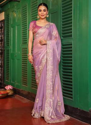 Garb These Fancy Party Wear Saree in Fine Colored.These Saree Are Tissue And Blouse is Fabricated On Art Silk Pair.Its Beautified With Fancy Disigner Embroidery Work Saree.