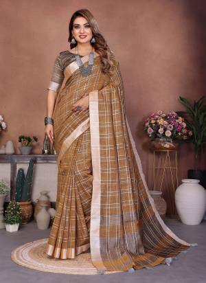 Garb These Party Wear Saree in Fine Colored.These Saree And Blouse is Fabricated On Linen Cotton.Its Beautified With Woven Checks Designer.
